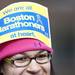 A bib is safety-pinned to volunteer Jillean Kitchen's hat before the run in honor of the Boston Marathon on Saturday, April 20. AnnArbor.com I Daniel Brenner